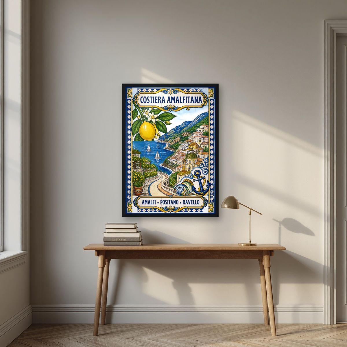 Ceramica Blu — Amalfi Coast art print, in a black frame, styled in a desk