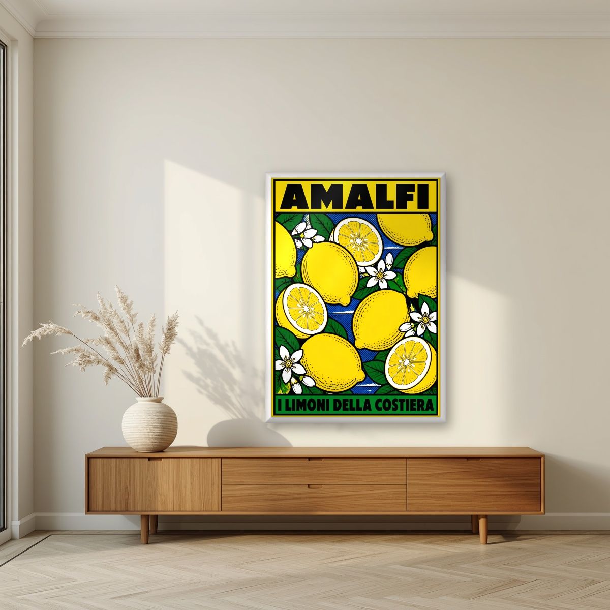 I Limoni Della Costiera — Amalfi Coast art print, in a white frame, styled in a living room