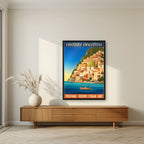 Positano — Amalfi Coast art print, in a black frame, styled in a living room