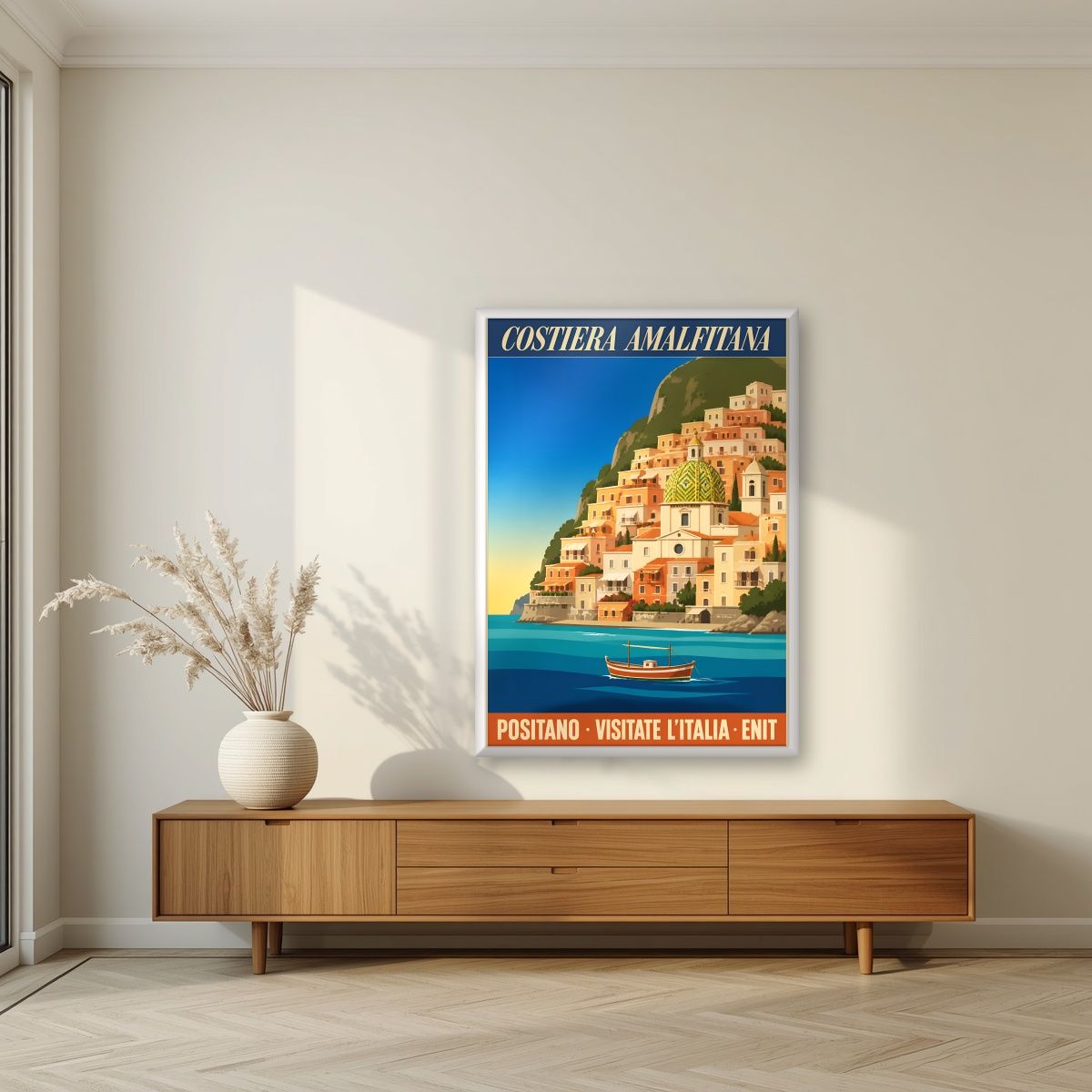 Positano — Amalfi Coast art print, in a white frame, styled in a living room