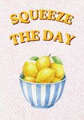 Squeeze The Day – Positano Pink art print: a single bold lemon painted with a determined look, set against soft positano pink stripes with hand-lettered type above.