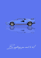 Be Anything You Want To Be – Blu art print: a blue Lamborghini Countach drawn flat in side profile, wedge shaped with a raised rear wing, mirrored quietly beneath the wheels, on a pale periwinkle ground, with the handwritten line Be anything you want to be! along the bottom