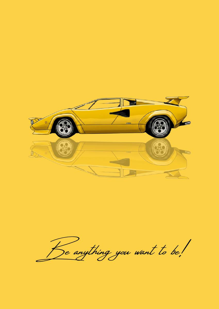 Be Anything You Want To Be – Giallo art print: a bright yellow Lamborghini Countach drawn flat in side profile, all wedge and straight edges with its rear wing up, mirrored softly below, on a warm yellow ground, with the handwritten line Be anything you want to be! along the bottom