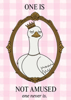 One Is Not Amused – Gingham Rose art print: cartoon illustration of a white goose in a gold crown and thin gold chain choker, head tipped slightly to one side, framed in an ornate brown-gold oval on pale pink gingham check, with black serif capitals ONE IS above and NOT AMUSED below