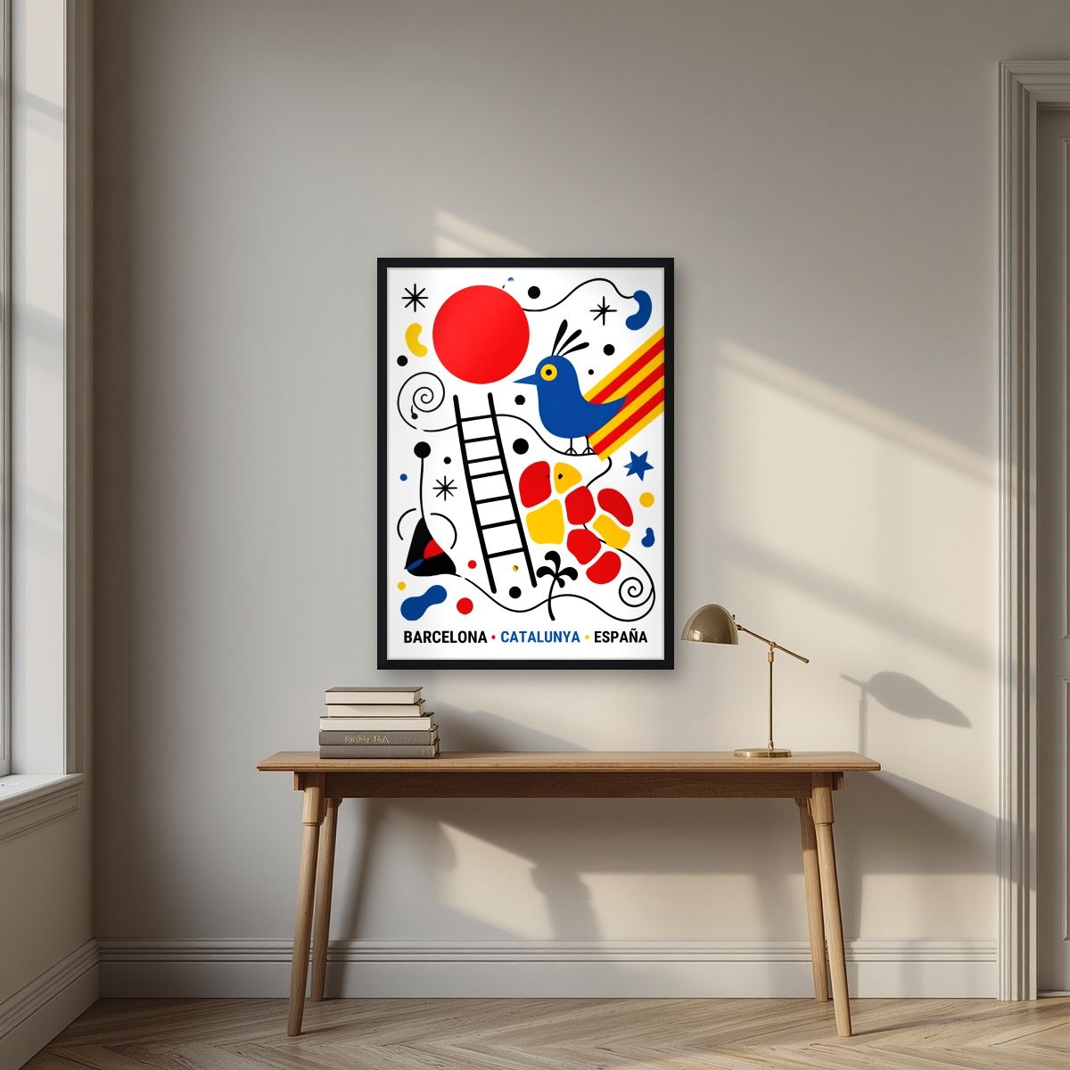 Ocell Blau — Barcelona art print, in a black frame, styled in a desk
