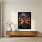 Bath by Lamplight in a black frame, above a walnut sideboard in a living room