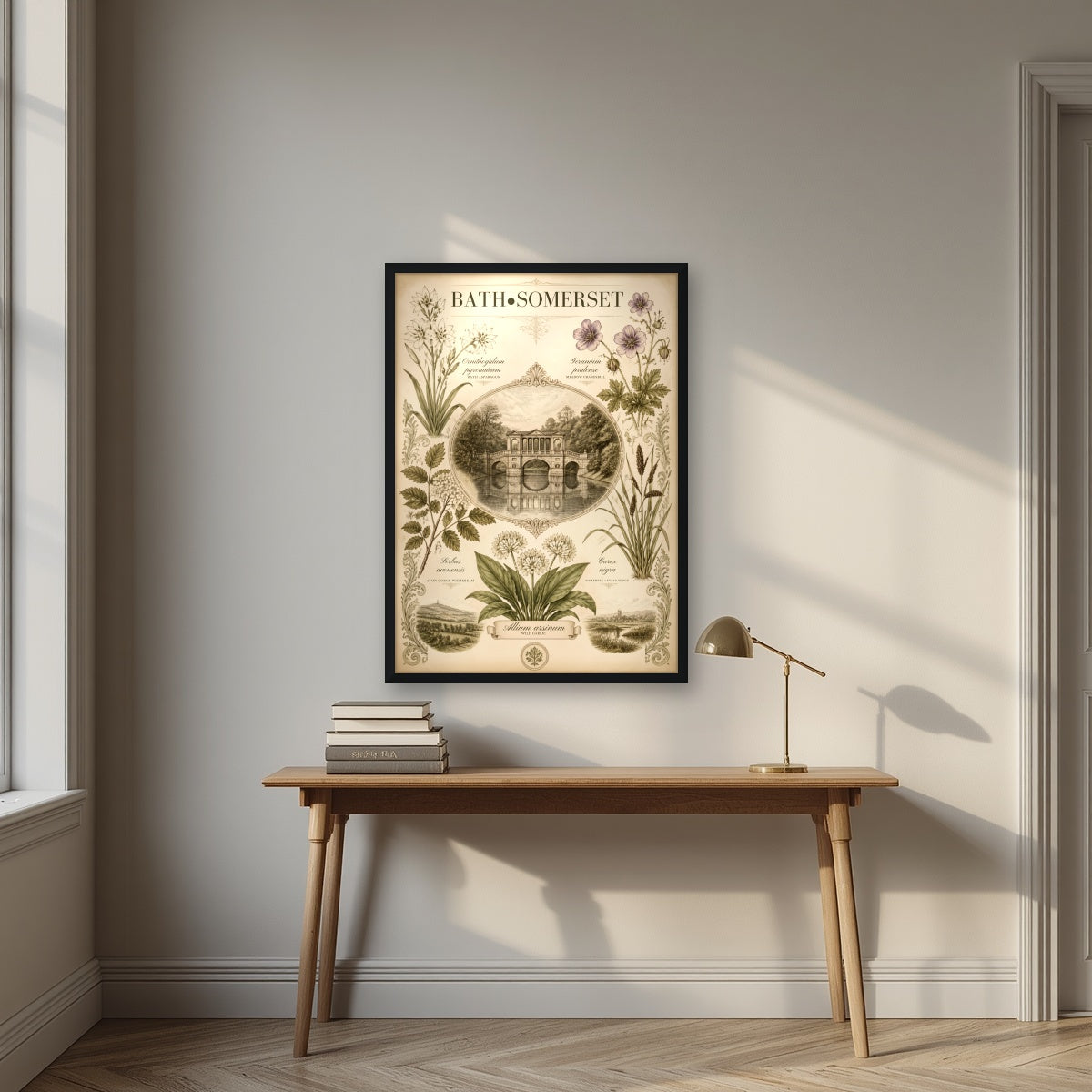 Bath, Somerset in a black frame, above an oak writing desk
