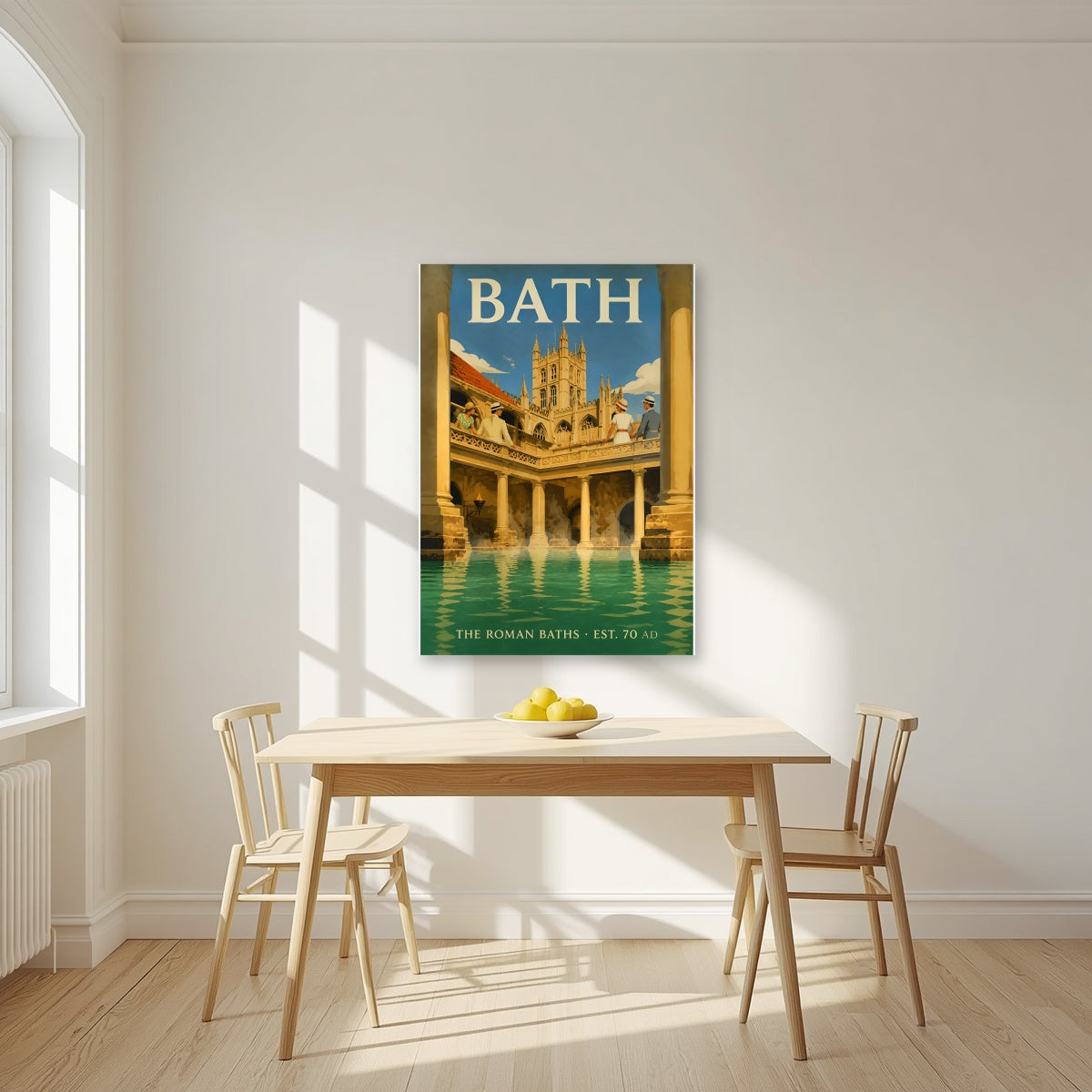 The Roman Baths as an unframed print, above a dining table in a bright kitchen