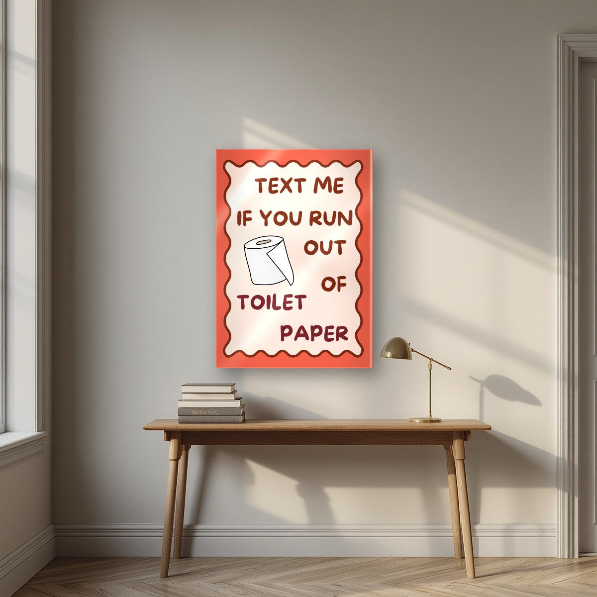 Text Me If You Run Out of Toilet Paper – Coral Clay art print, as an acrylic print, styled in a desk