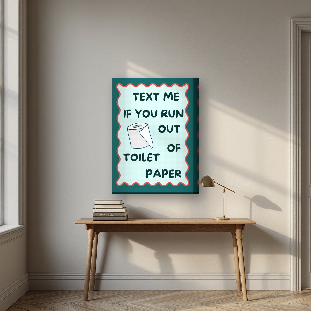 Text Me If You Run Out of Toilet Paper – Seafoam Teal art print, on thick canvas, styled in a desk