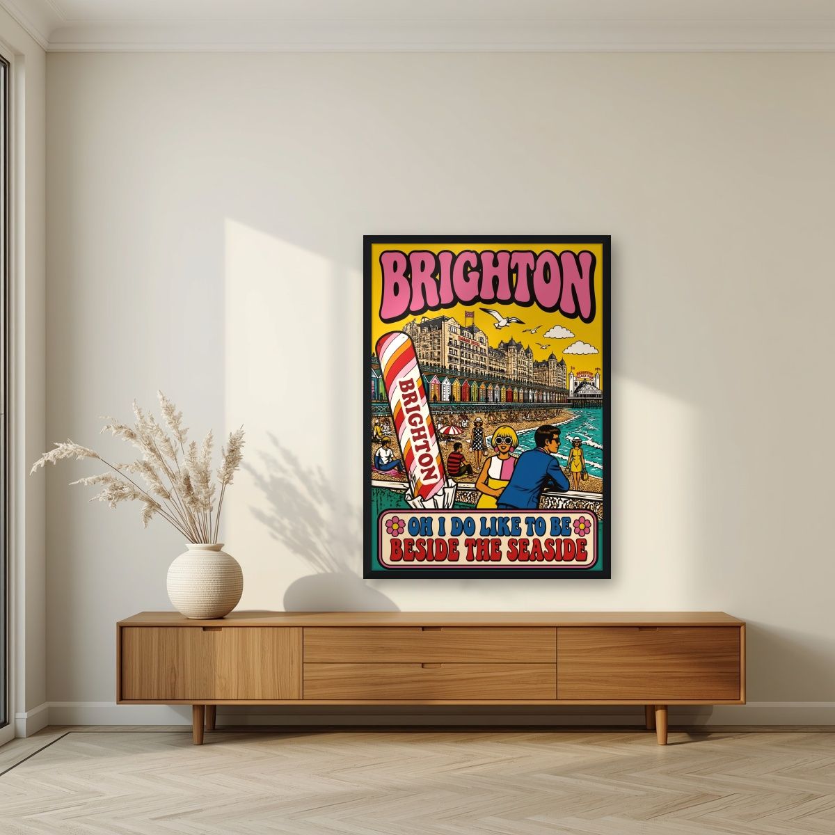 Beside The Seaside — Brighton art print, in a black frame, styled in a living room