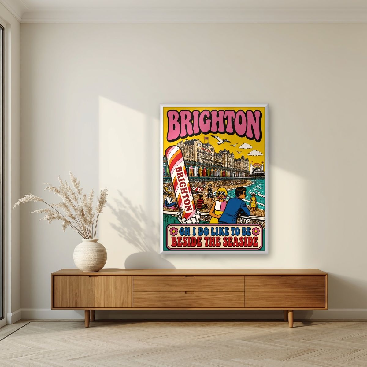 Beside The Seaside — Brighton art print, in a white frame, styled in a living room
