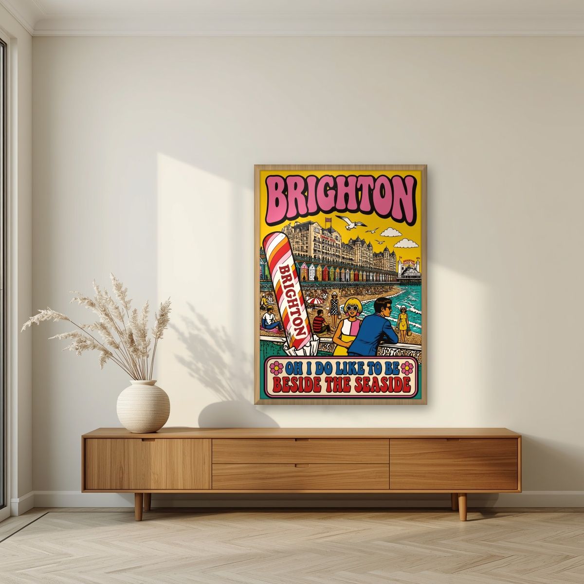 Beside The Seaside — Brighton art print, in an oak frame, styled in a living room