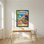 Clifton Village in a black frame, above a dining table in a bright kitchen
