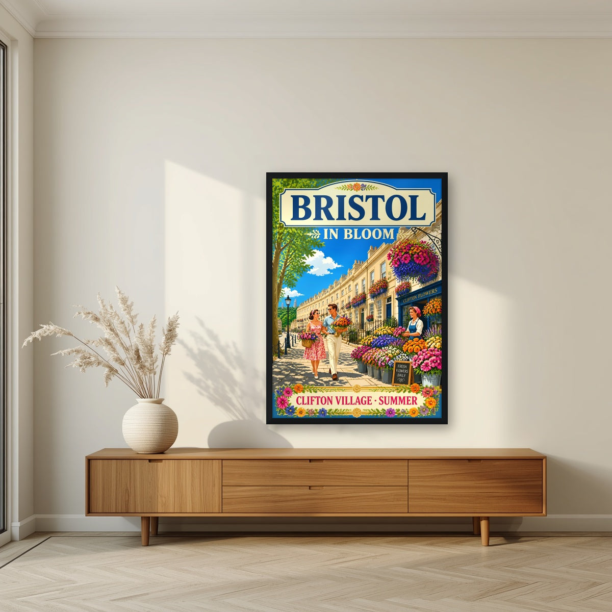 Clifton Village in a black frame, above a walnut sideboard in a living room