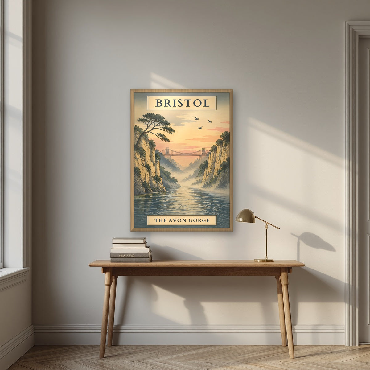 The Avon Gorge in an oak frame, above an oak writing desk