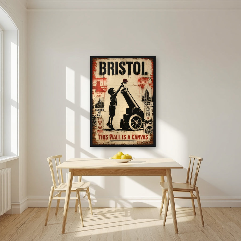 This Wall is a Canvas in a black frame, above a dining table in a bright kitchen