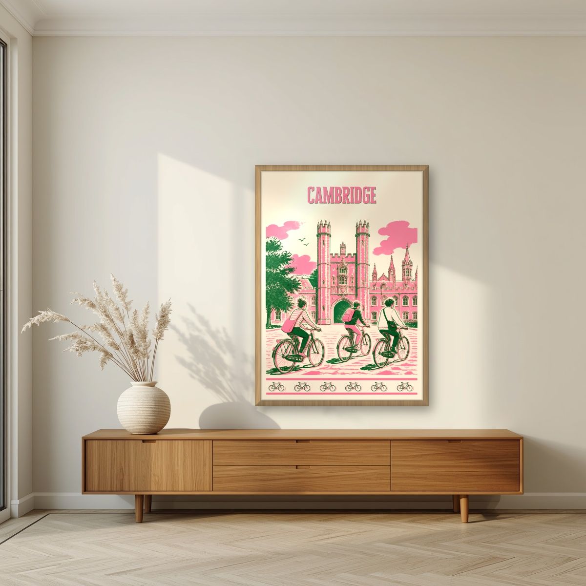 Bicycles At Trinity — Cambridge art print, in an oak frame, styled in a living room