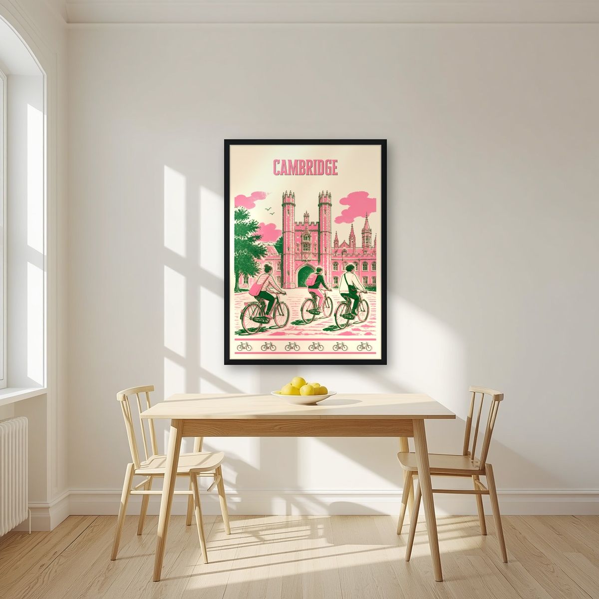 Bicycles At Trinity — Cambridge art print, in a black frame, styled in a kitchen