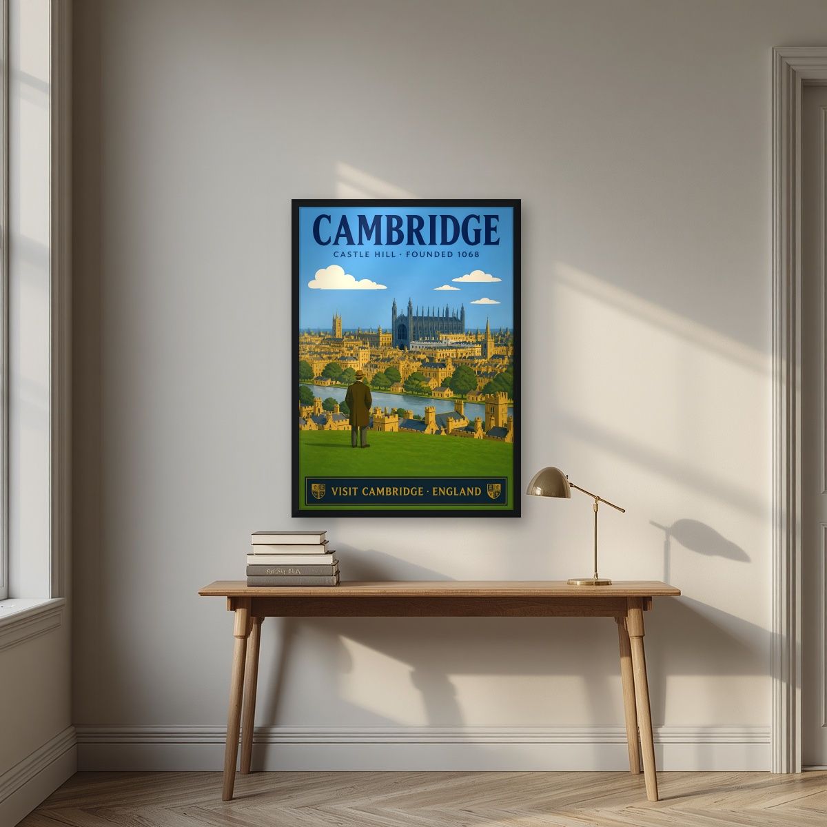 Castle Hill — Cambridge art print, in a black frame, styled in a desk