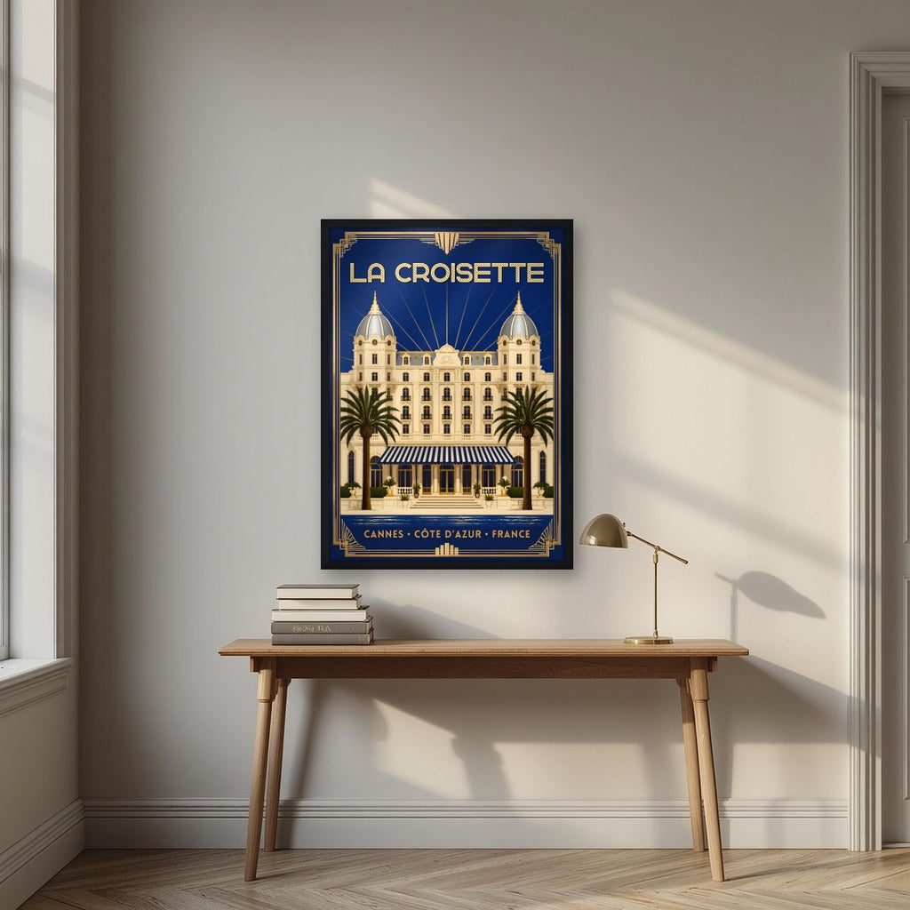 La Croisette — Cannes art print, in a black frame, styled in a desk