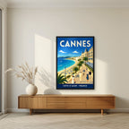 Les Élégants — Cannes art print, in a black frame, styled in a living room