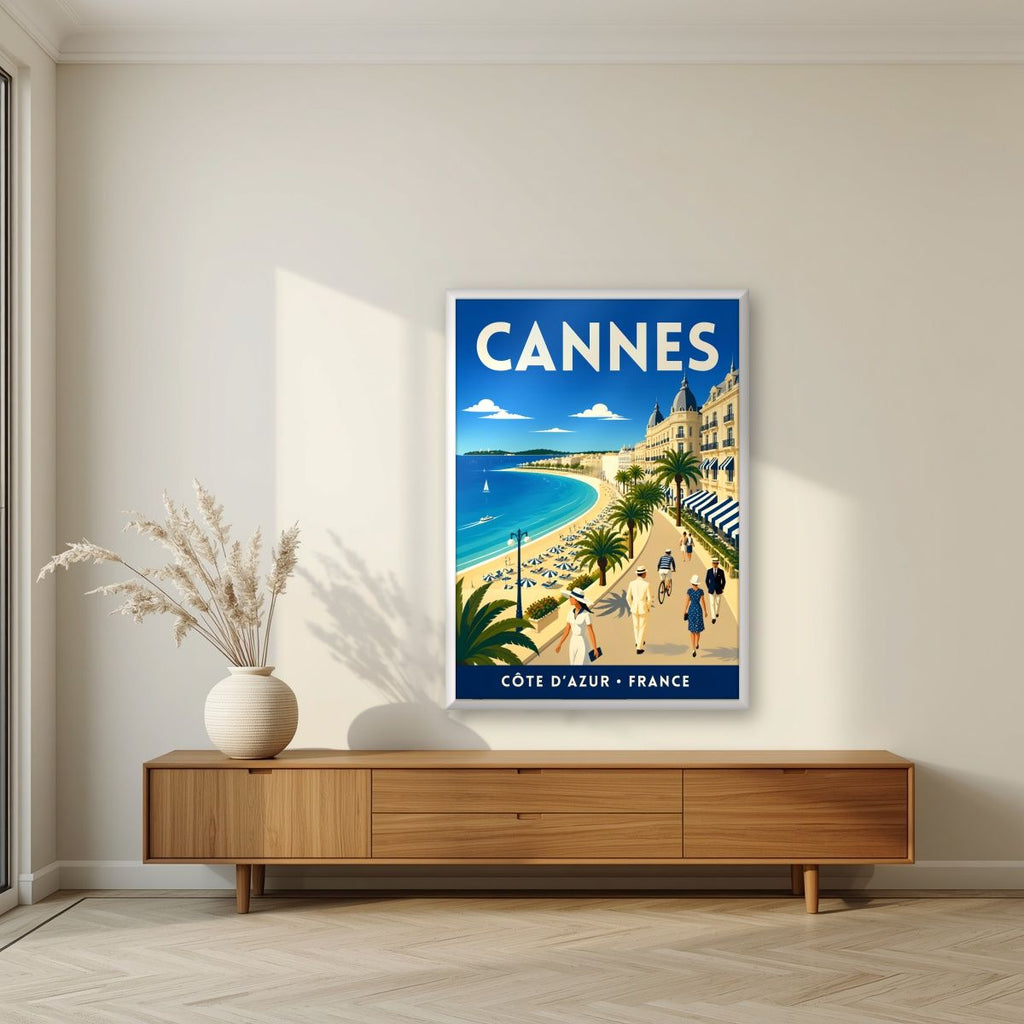 Les Élégants — Cannes art print, in a white frame, styled in a living room