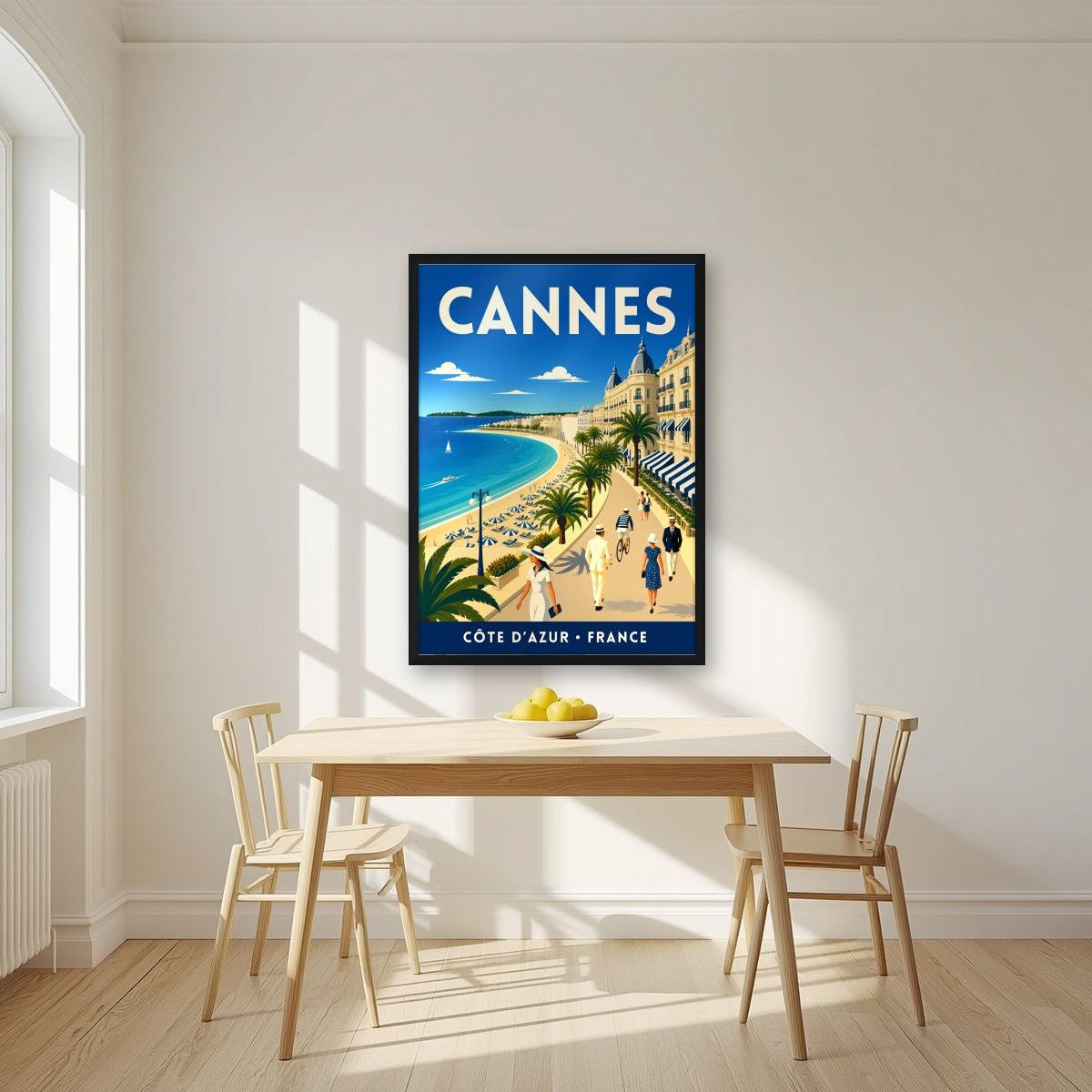 Les Élégants — Cannes art print, in a black frame, styled in a kitchen