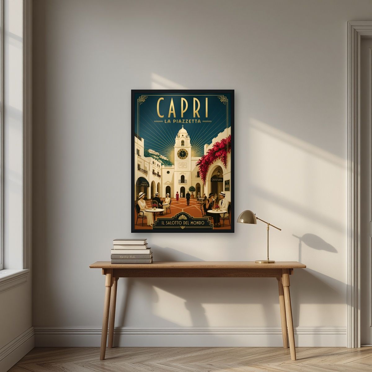 La Piazzetta — Capri art print, in a black frame, styled in a desk