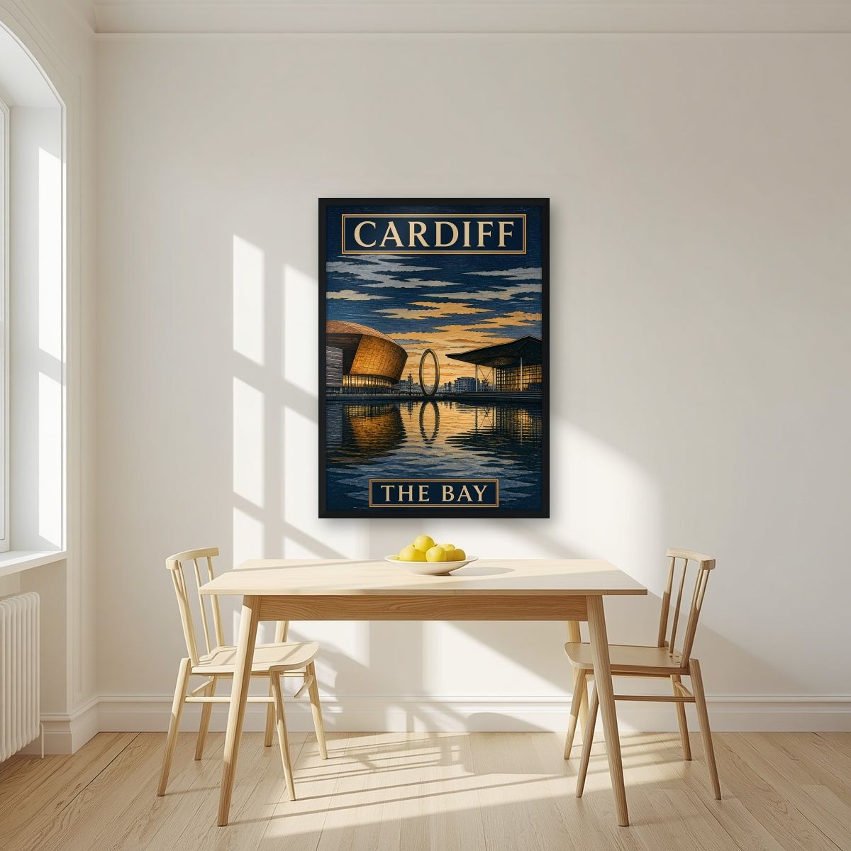 The Bay — Cardiff art print, in a black frame, styled in a kitchen