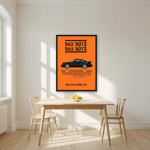 Bad Boys – Blaze Orange art print, in a black frame, styled in a kitchen