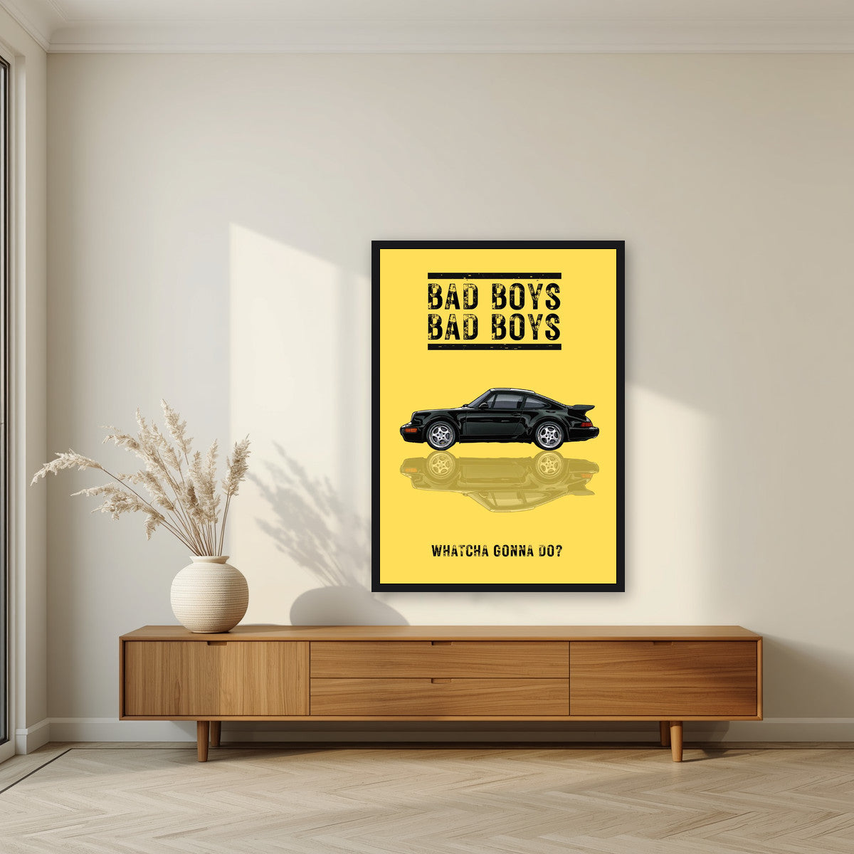 Bad Boys – Siren Yellow art print, in a black frame, styled in a living room