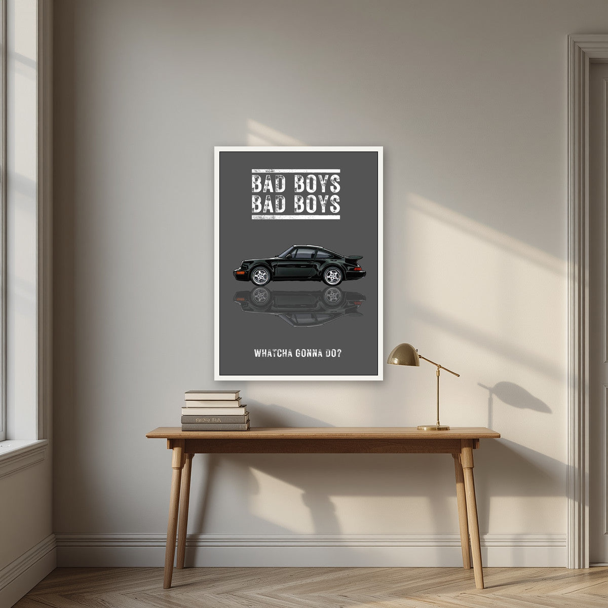 Bad Boys – Slate Grey art print, in a white frame, styled in a desk