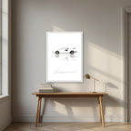 Be Anything You Want To Be – Bianco art print, in a white frame, styled in a desk