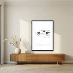 Be Anything You Want To Be – Bianco art print, in a black frame, styled in a living room
