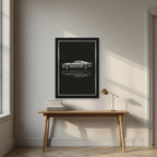 Eleanor – Tarmac Black art print, in a black frame, styled in a desk