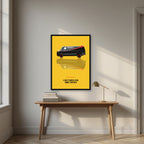 I Love It When a Plan Comes Together – Amber Yellow art print, in a black frame, styled in a desk