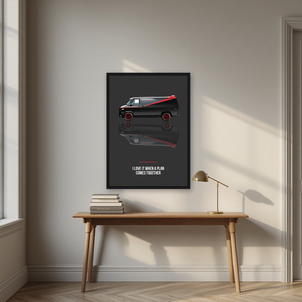 I Love It When a Plan Comes Together – Charcoal art print, in a black frame, styled in a desk