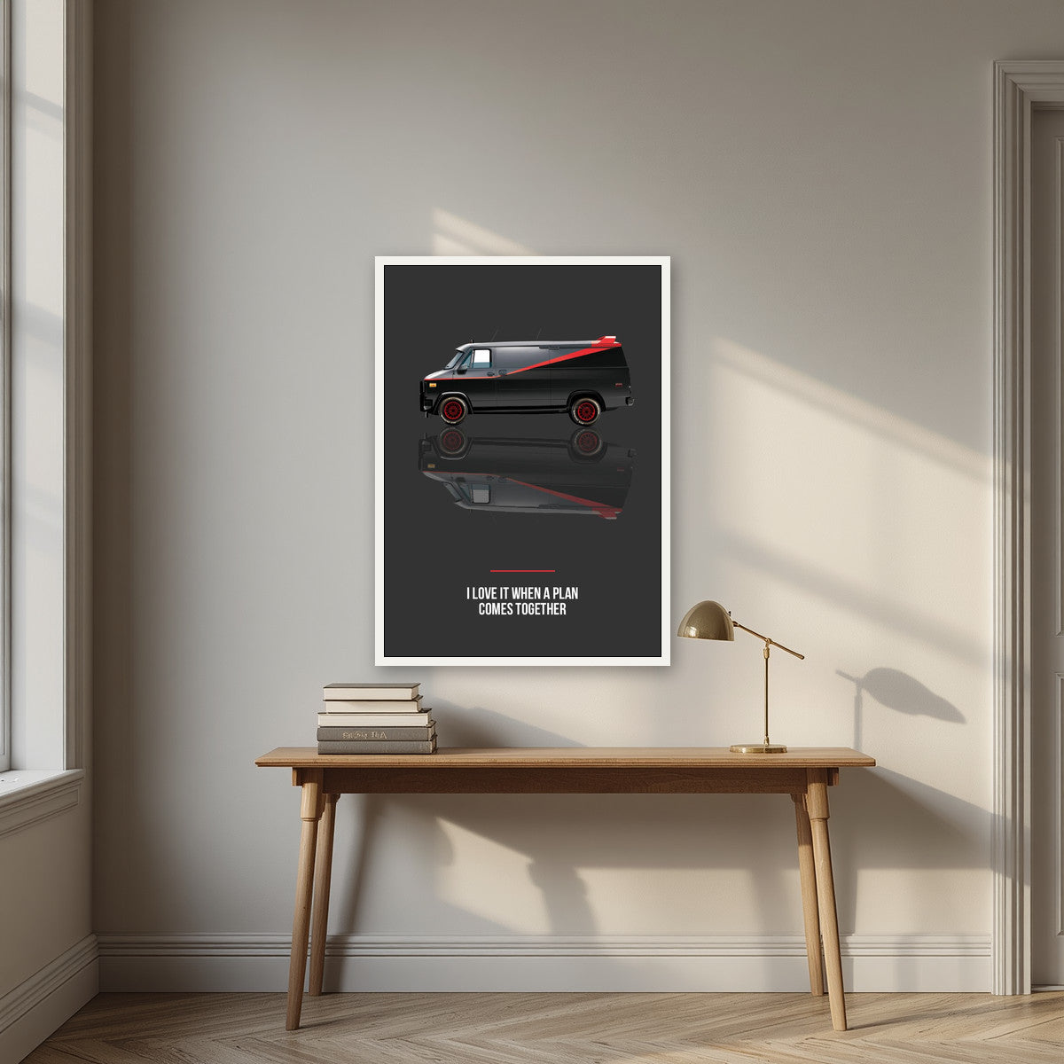 I Love It When a Plan Comes Together – Charcoal art print, in a white frame, styled in a desk