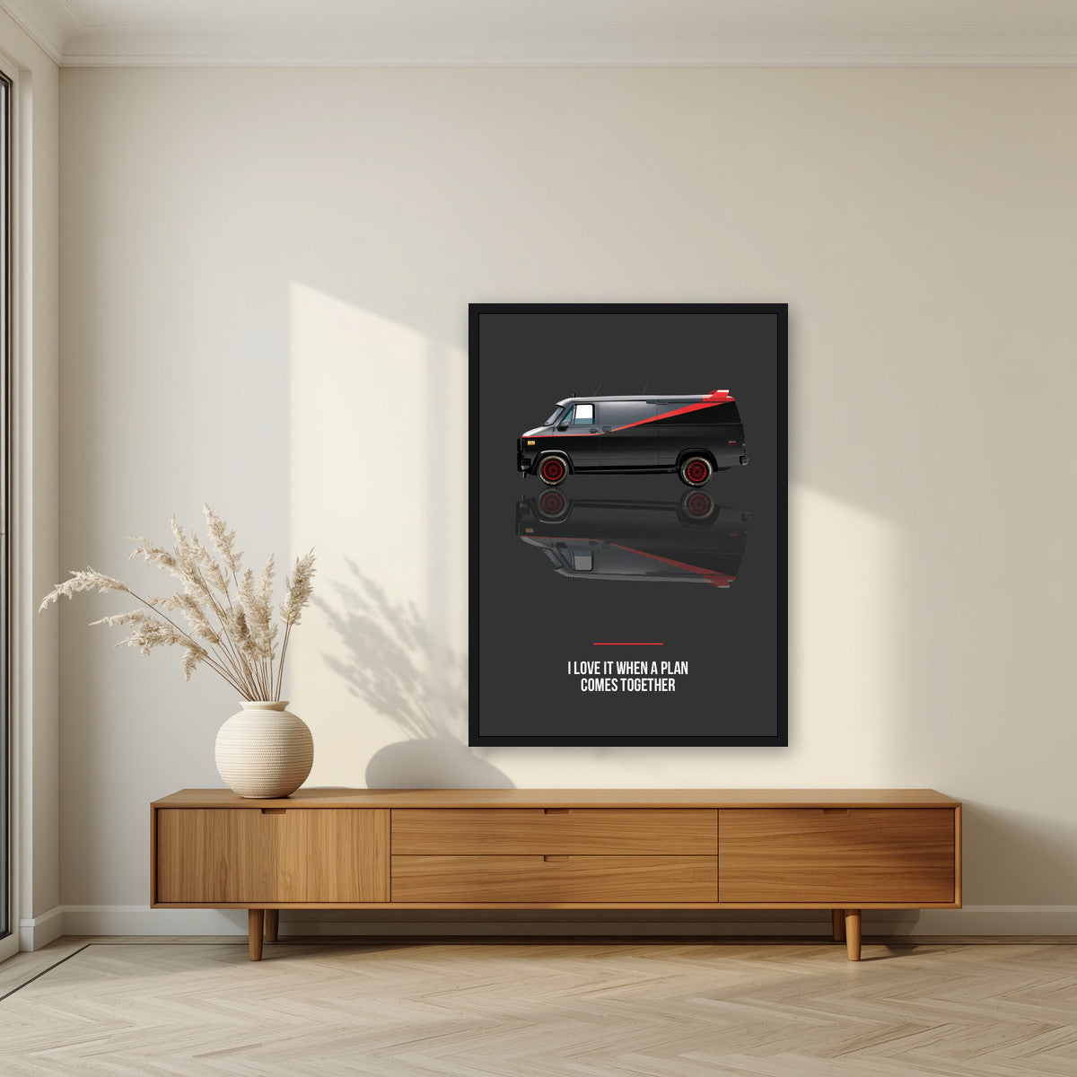 I Love It When a Plan Comes Together – Charcoal art print, in a black frame, styled in a living room