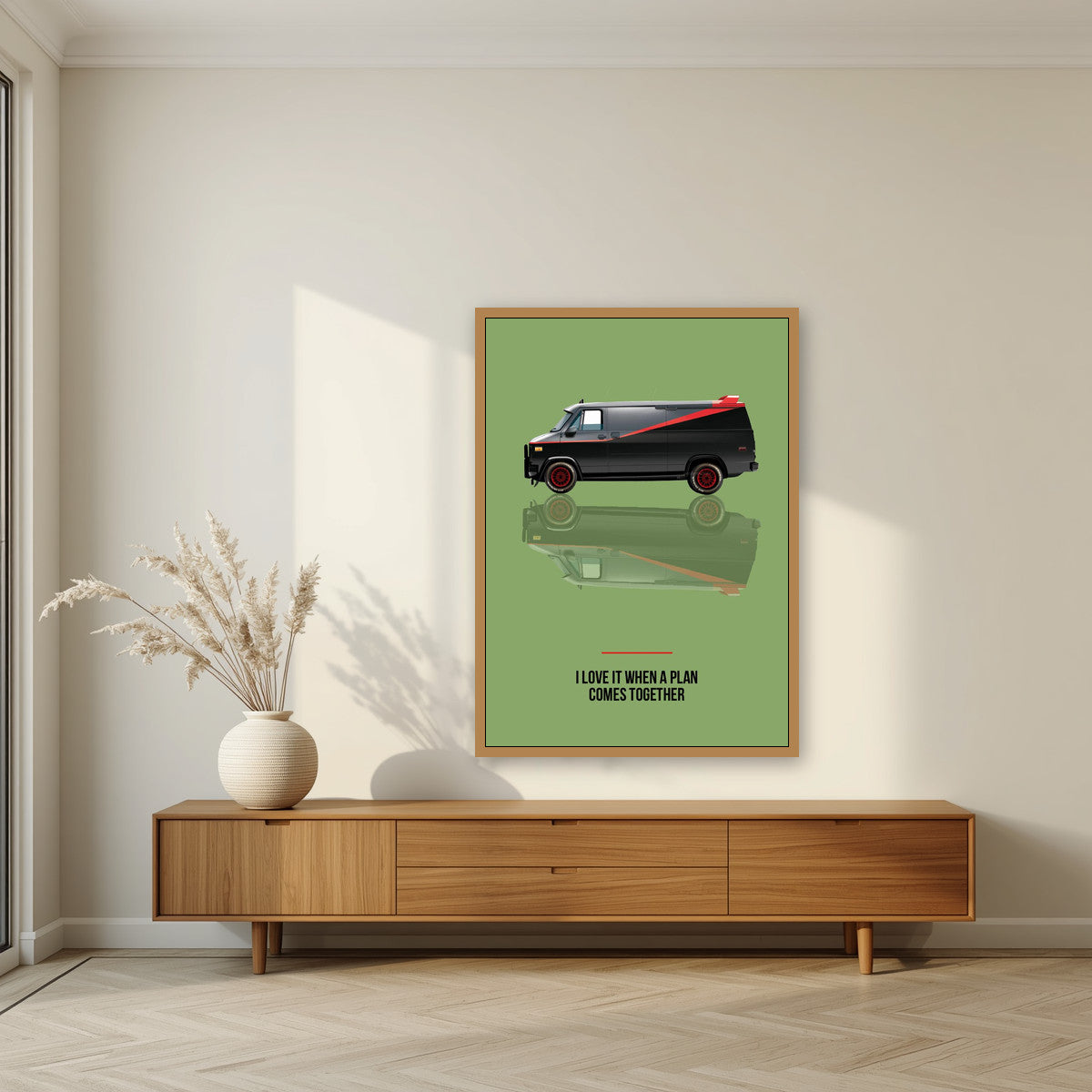 I Love It When a Plan Comes Together – Fatigue Green art print, in an oak frame, styled in a living room
