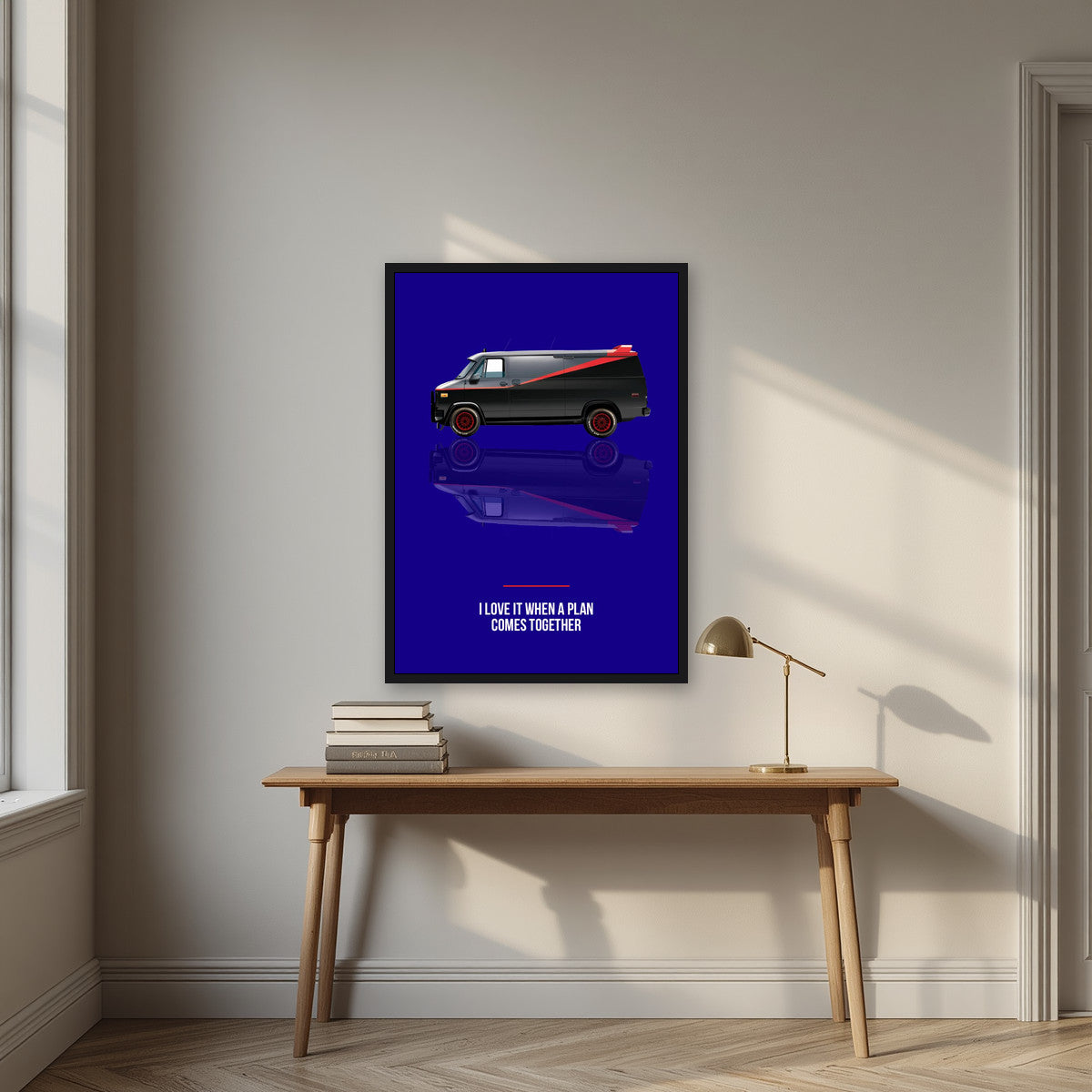 I Love It When a Plan Comes Together – Midnight Navy art print, in a black frame, styled in a desk