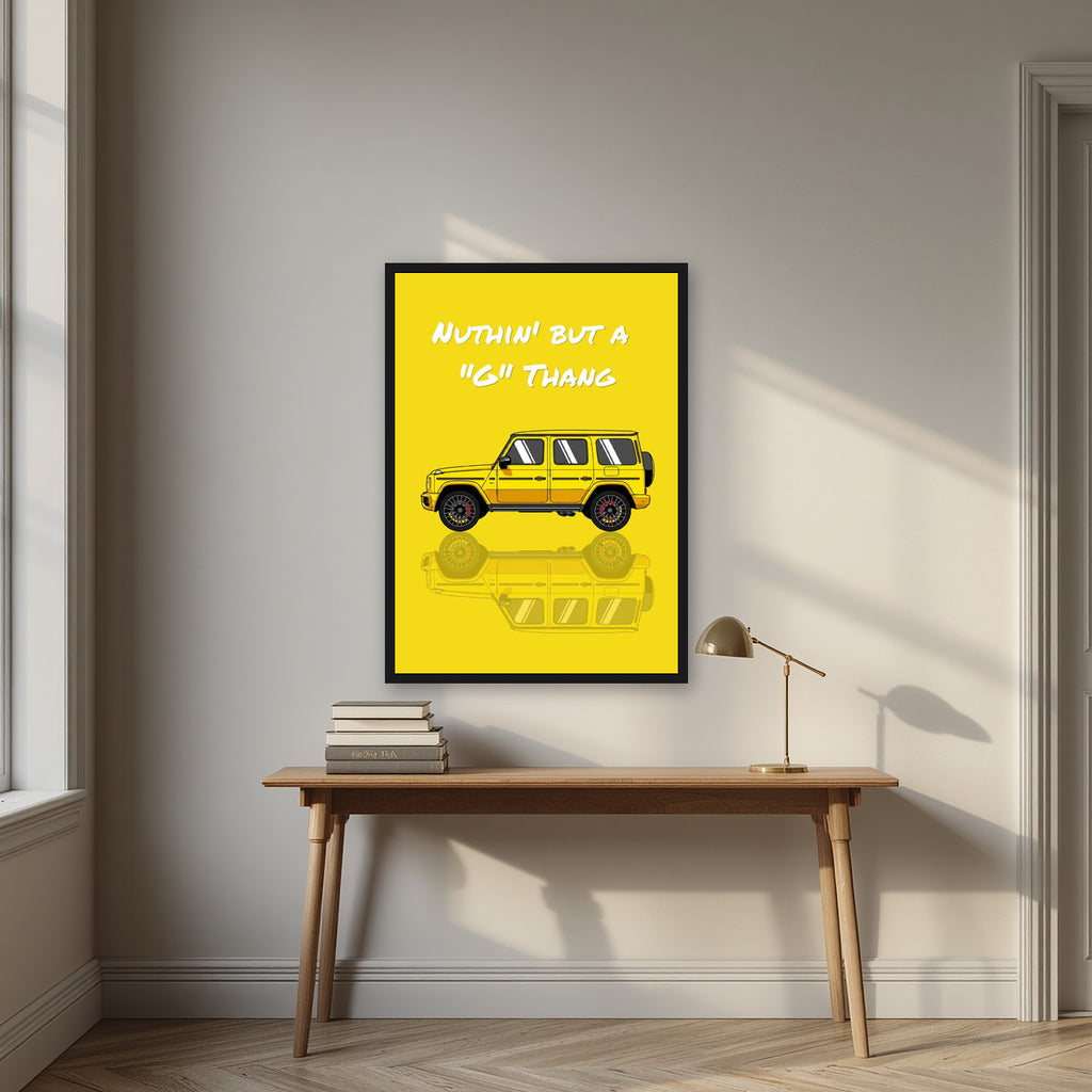 Nuthin' But A "G" Thang – Sunbeam Yellow art print, in a black frame, styled in a desk