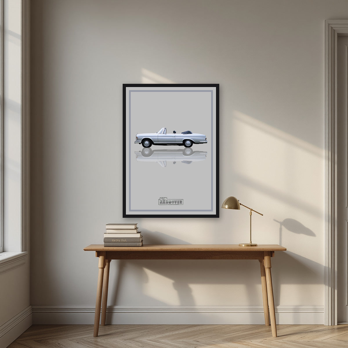 The Hangover – Silver Mist art print, in a black frame, styled in a desk