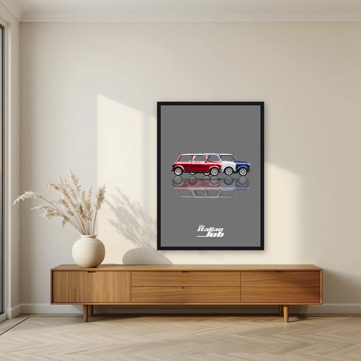 The Italian Job – Getaway Grey art print, in a black frame, styled in a living room