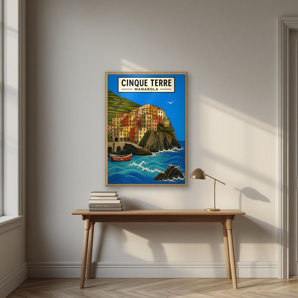 Manarola Blu — Cinque Terre art print, in an oak frame, styled in a desk