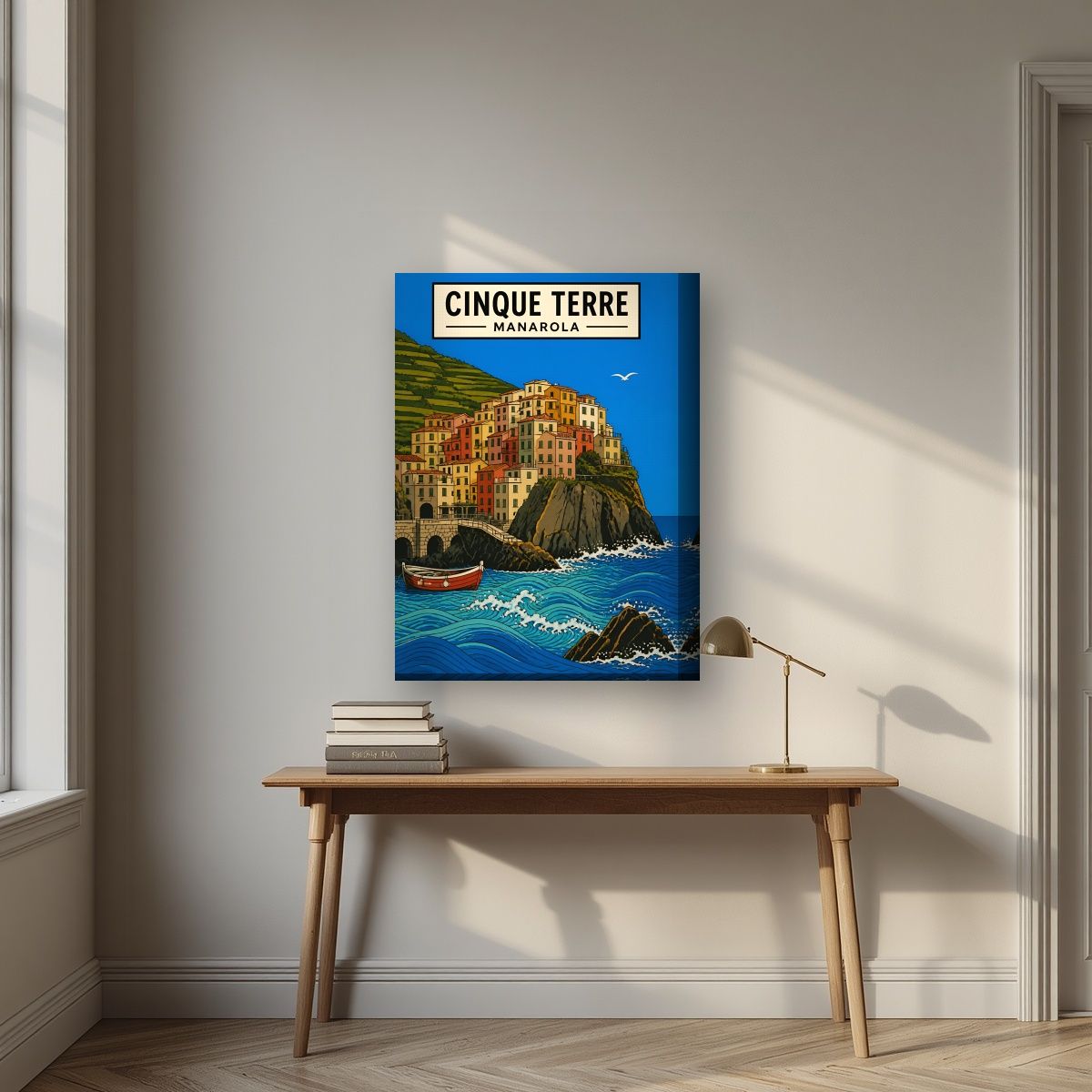 Manarola Blu — Cinque Terre art print, on thick canvas, styled in a desk