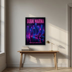 Marina After Dark in a black frame, above an oak writing desk