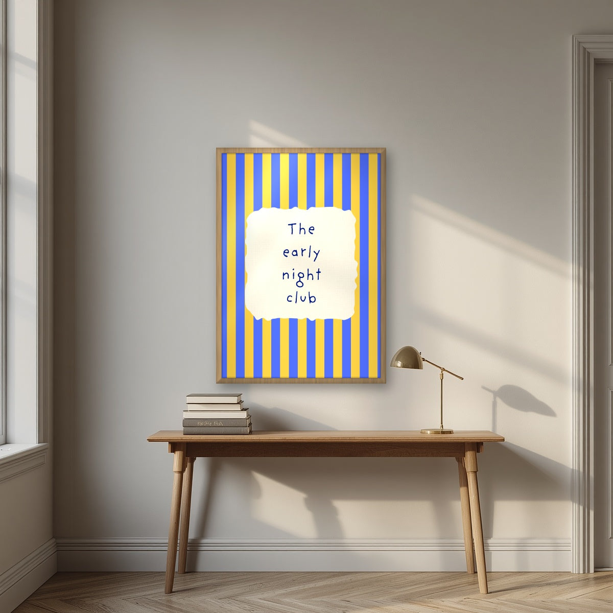 The Early Night Club – Cornflower Stripe print in an oak frame above a desk