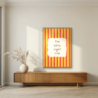 The Early Night Club – Marmalade Stripe print in an oak frame in a living room